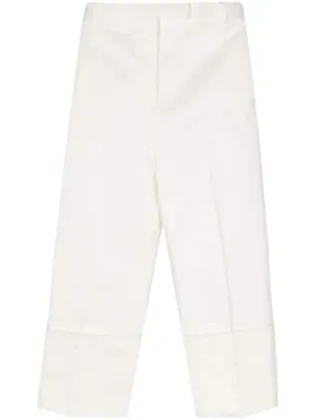 pressed-crease tapered trousers